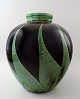 Kähler, Denmark, large glazed stoneware floor vase in modern design.
1940s.