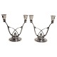 Georg Jensen, Harald Nielsen; A pair of "Acorn" candlesticks of sterling silver 
#619