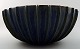 Arne Bang. Very large bowl of stoneware with fluted body with bluegreen glaze.