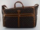 Louis Vuitton: Large vintage travel bag of monogram canvas