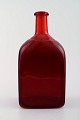 Riihimaki Riihimaen, Finland, decanter/bottle of red art glass.
1960s. Finnish design.