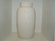 Royal Copenhagen blanc de chine
Tall vase decorated with four people from 1956