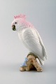 Art deco Royal Dux papegøje på gren, porcelæn.