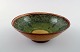 Gudrun Meedom Bæch (1915-2011). Ceramic bowl decorated with stylized 
ornamentation and glaze in green colors.