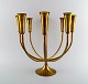 Eight armed candlestick of brass. Danish design, 60/70 s.
