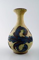 Kähler, Denmark, glazed stoneware vase in modern design.
1930/40 s. Cow horn technique.