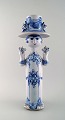 Bjørn Wiinblad ceramics, blue lady with two birds.
Decoration number M35.