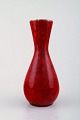Richard Uhlemeyer, German ceramist.
Ceramic vase, beautiful cracked glaze in red shades.