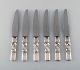 Georg Jensen. Cutlery, Scroll no. 22, hammered Sterling Silver consisting of: 6 
dinner knives.