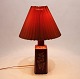 Red table lamp in ceramic by Desiree Stone ware factory from the 1970s.
5000m2 showroom.