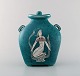 Wilhelm Kåge, Gustavsberg, Argenta Art deco vase with lid. decorated with naked 
woman.
