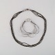 Swedish modernist necklace and bracelet in sterling silver. 1970.
