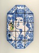 BJØRN WIINBLAD. The blue house.
Very rare large wall plaque, decorated in blue with woman and bird.