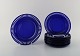 William Stenberg and Estrid Ericson for Gullaskruf. 9 plates in dark blue art 
glass. Sweden 1960 / 70