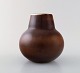 Carl-Harry Stålhane for Rørstrand. Ceramic vase decorated with beautiful glaze 
in brown shades. 1950