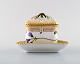 Royal Copenhagen Flora Danica triangular cream cup. Dessin # 20/3575 with branch 
shaped handle and flowers.