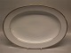 015 Stort ovalt stegefad 40 x 28 cm (315)	 B&G Menuet: Hvidt porcelæn, takket 
guldkant, hvid, form 601 Bing & Grøndahl 
