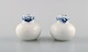 Royal Copenhagen blue painted Princess salt and pepper set in porcelain. 
Model Number 711/712.