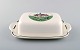 Villeroy & Boch Naif butter container in porcelain decorated with naivist 
village motif.