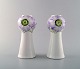 Rörstrand / Rorstrand. A pair of art nouveau vases in porcelain decorated with 
violet and green flowers in relief. Ca. 1900.