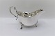 English Small gravy boat in sterling silver. Produced Birmingham 1930. Length 15 
cm.