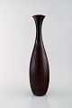 Carl-Harry Stålhane for Rörstrand / Rørstrand. Stylish vase in glazed ceramics. 
Fantastic metallic glaze in brown shades.