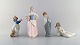 Tengre, Nao og Zaphir, Spanien. Fire barnefigurer i glaseret porcelæn. 
1900-tallet.
