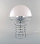 Verner Panton (1926-1998). Rare table lamp - "Wire Lamp". Chromed steel frame 
with shade of white plastic. 1960/70