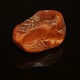 A large piece of amber. L: 7,8cm. W: 85gr