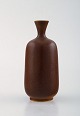 Berndt Friberg for Gustavsberg. Modernist vase in ceramics. Beautiful glaze in 
brown shades. 1960