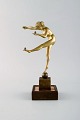 Art deco bronze sculpture. Naked woman juggling balls. Foot in brass with pink 
marble. 1930