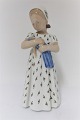 Bing & Grondahl. Girl with doll. Model 1721. Height 19.5 cm. (2. quality)