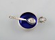 Johan Rohde for Georg Jensen. "Acorn" salt cellar in sterling silver with blue 
enamel and salt spoon.