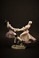 Bing & Grøndahl porcelæns figur i overglasur.
"Dansende par" 
B&G# 8020.
H:14,4cm.