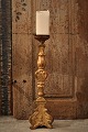 Antique 1800s French carved altar candlestick in wood with old gilding and a 
fine old patina. H:48cm.