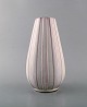 Upsala-Ekeby vase in white glazed ceramics. Ribbed design, 1950