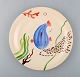 Stig Lindberg for Gustavsberg. "Löja" plate. Hand painted with fish motifs. 
1950