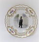 Royal Copenhagen. Plate with open-work border. Diameter 19 cm. Motiv; police 
officer. Produced before 1923.