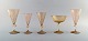 Barovier and Toso, Venice. Five art deco glasses in hand painted mouth blown art 
glass. Champagne glass and wine glass. Ca. 1940