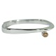 A small bangle set with fancy coloured diamond mounted in 14k white gold