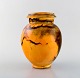 Svend Hammershøi for Kähler, HAK. Vase i glaseret stentøj. Smuk gul uranglasur. 
1930/40