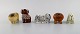Lisa Larson for Gustavsberg. Five dogs in glazed ceramics. Poodle, bulldog, 
pekingese and others. 1970