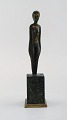 Bronze sculpture on marble pedestal. Naked woman in minimalist style. Mid 20th 
century.
