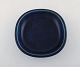 Nils Thorsson for Aluminia. "Marselis" faience bowl with geometric pattern in 
beautiful blue glaze. Mid 20th century.
