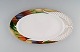 Paul Wunderlich for Rosenthal. Large "Mythos" porcelain serving dish. 1980 / 
90