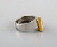 Micke Berggren, Sverige. Modernistisk designerring i tin og messing. Sent 
1900-tallet. 
