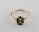 Scandinavian goldsmith. 8 carat art deco gold ring adorned with cultured pearls. 
Mid 20th century.
