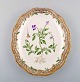 Royal Copenhagen Flora Danica pierced dish in hand painted porcelain. Dated 
1947.
