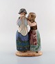 Lladro, Spain. Large figure in glazed ceramics. Late 20th century.
