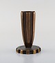 Vendor, Denmark. Art deco candle holder in patinated bronze. 1940 / 50